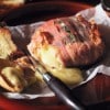 Prosciutto-wrapped baked camembert