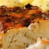 Filetes de pescado con salsa de espinaca y tomate