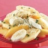 Ensalada de fruta, con coco y crema