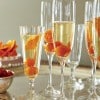 Coctel de champagne y kumquat