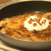 Papas con Tocino y Queso